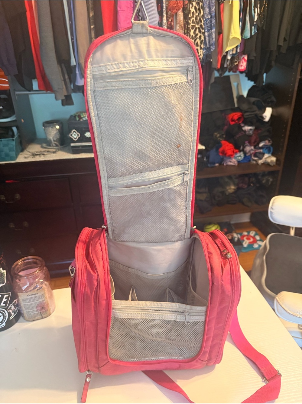 Pink Woman’s travel toiletries bag. Used